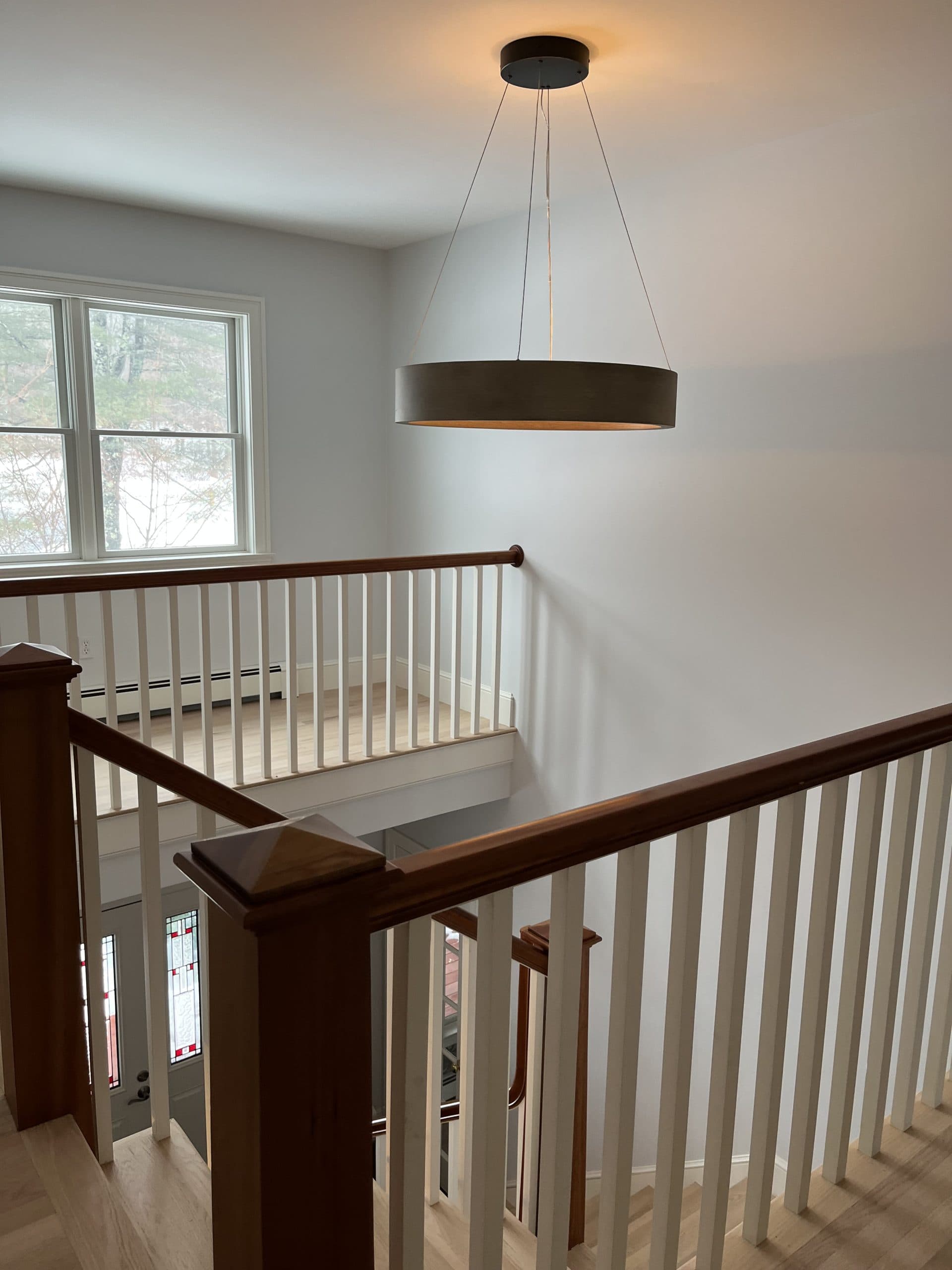 Beautiful chandelier installation by Josh Laferriere Electric